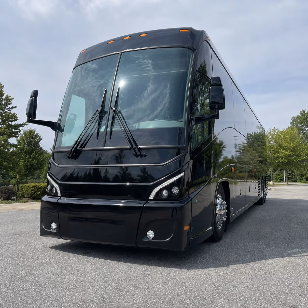 bringing a large group compare full size motorcoaches with luggage space built in